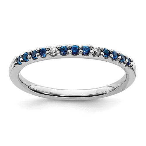 14k white gold diamond and sapphire ring with intricate band design, featuring sparkling gemstones and elegant craftsmanship.