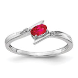 14k white gold oval diamond and ruby bypass ring with polished finish, designed by Solomon Jewelers.