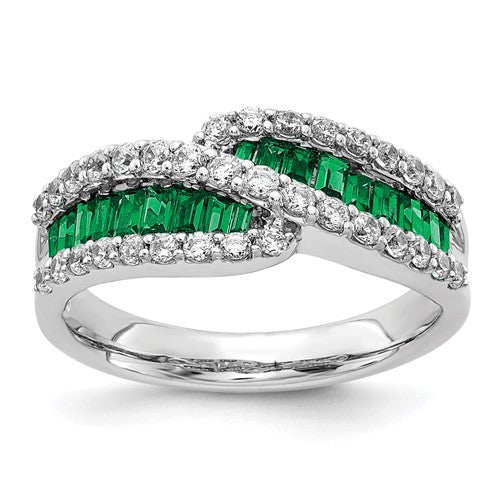 14k white gold emerald diamond ring with a central emerald and sparkling diamonds, crafted by Solomon Jewelers.
