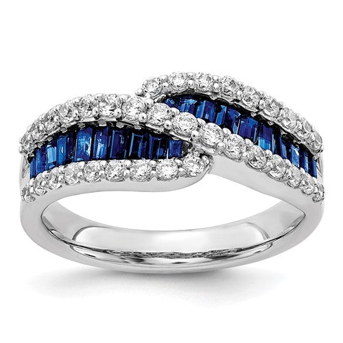 14k white gold sapphire and diamond ring showing a central sapphire gemstone with surrounding diamonds, elegant jewelry piece.