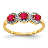 14k gold composite ruby and diamond 3-stone ring with intricate design, featuring sparkling gemstones and elegant craftsmanship.