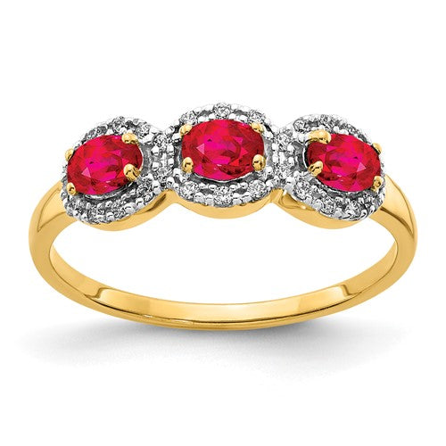 14k gold composite ruby and diamond 3-stone ring with intricate design, featuring sparkling gemstones and elegant craftsmanship.