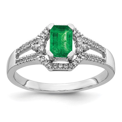 14k white gold ring featuring diamonds and emeralds, elegant jewelry piece with intricate design and sparkling gemstones.