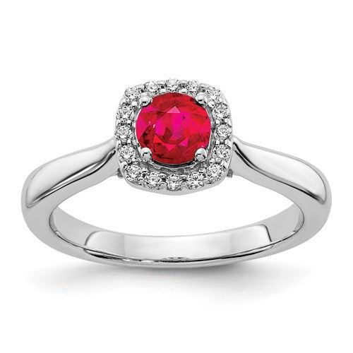 14k white gold halo ring with sparkling diamonds and vibrant rubies, showcasing elegant jewelry design.