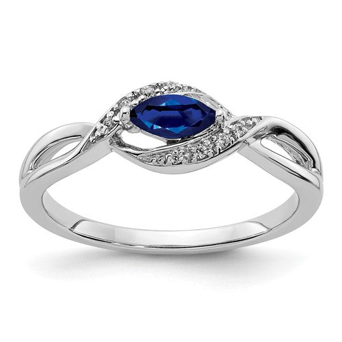14k white gold diamond and marquise sapphire ring showcasing sparkling stones and elegant design.