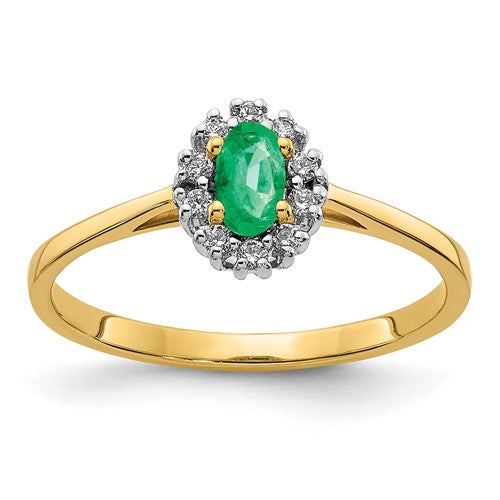 14k gold diamond and oval emerald halo ring with intricate detailing, showcasing sparkling gemstones and elegant craftsmanship.