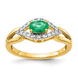 14k gold ring featuring diamonds and emeralds from Solomon Jewelers, showcasing intricate craftsmanship and vibrant gemstone design.