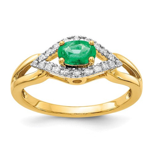 14k gold ring featuring diamonds and emeralds from Solomon Jewelers, showcasing intricate craftsmanship and vibrant gemstone design.