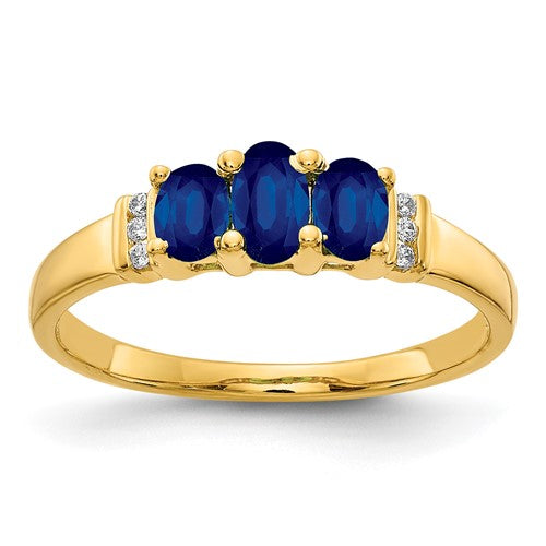 14k polished gold triple sapphire and diamond 3-stone ring showcasing vibrant blue sapphires and sparkling diamonds.