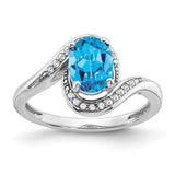 14k-white-gold-oval-blue-topaz-and-diamond-bypass-ring-SolomonJeweler-Wichita-KS-CustomJewelry