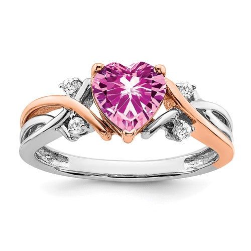 14k two-tone heart-shaped ring with pink sapphire and diamond accents from Solomon Jewelers, showcasing intricate jewelry craftsmanship.