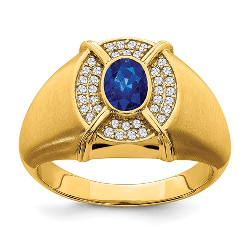 14k gold men's ring featuring sapphires and diamonds, elegant jewelry piece with intricate design from Solomon Jewelers.