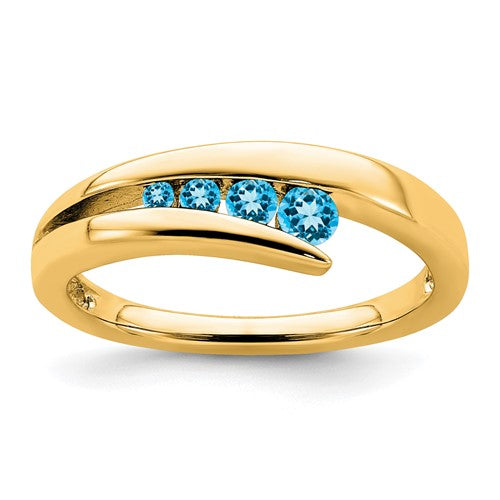 14k gold blue topaz 4-stone ring featuring sparkling blue gemstones and a polished band, perfect for elegant jewelry collection.