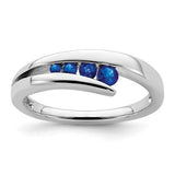 14k white gold sapphire 4-stone ring with detailed band design, showcasing elegant jewelry craftsmanship.