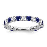 14k white gold created sapphire and diamond ring featuring a band with sparkling gemstones and elegant design.
