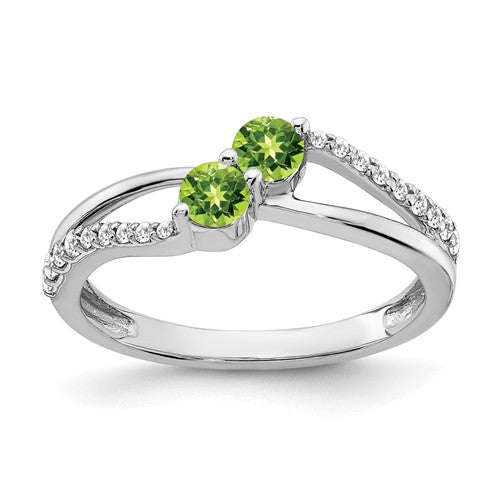 14k white gold peridot and diamond two-stone ring with intricate band design by Solomon Jewelers.