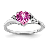 14k white gold pink sapphire and diamond heart ring, showcasing sparkling gemstones and intricate jewelry design.