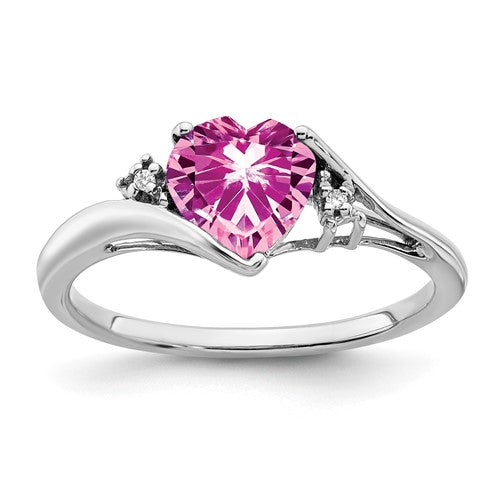 14k white gold pink sapphire and diamond heart ring, showcasing sparkling gemstones and intricate jewelry design.