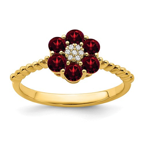14k garnet and diamond floral ring showcasing rich red garnet stones and sparkling diamonds in a detailed gold setting.