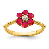 14k gold ruby and diamond floral ring with intricate design, showcasing vibrant gemstones and elegant craftsmanship.