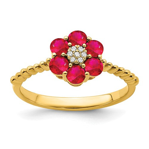14k gold ruby and diamond floral ring with intricate design, showcasing vibrant gemstones and elegant craftsmanship.