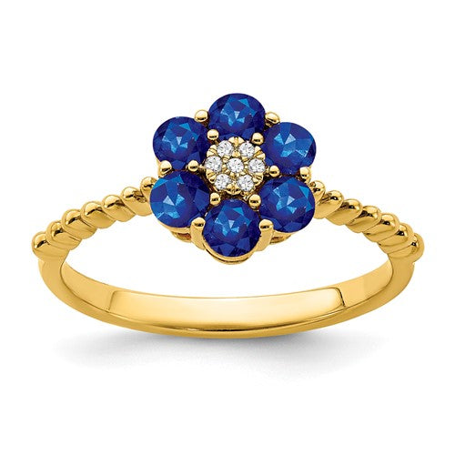 14k gold sapphire and diamond floral ring featuring intricate design, elegant jewelry piece by Solomon Jewelers.