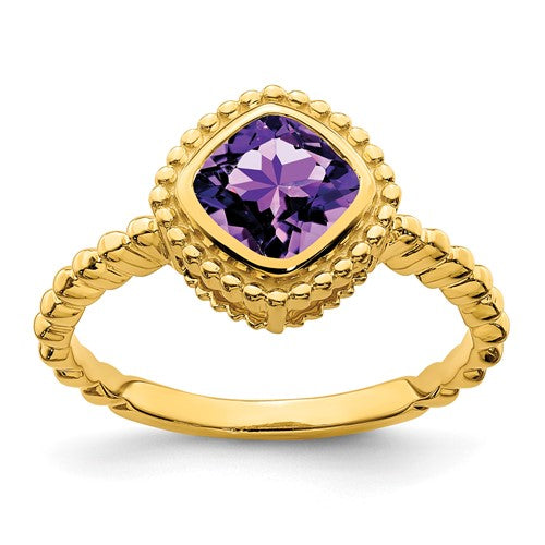 14k gold cushion amethyst ring with a bezel-set purple gemstone, featuring a elegant jewelry design.