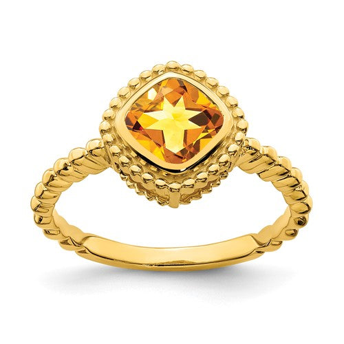 14k gold cushion citrine ring with a large yellow gemstone set in a gold band, elegant jewelry piece from Solomon Jewelers.