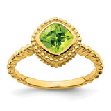 14k cushion peridot ring featuring a vibrant green peridot gemstone set in a gold band, designed by Solomon Jewelers.