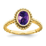 14k gold oval amethyst ring with a decorative band, featuring a large purple amethyst gemstone set in Solomon Jewelers jewelry.
