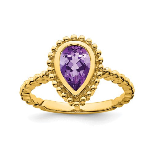 14k gold pear-shaped amethyst ring with intricate band design, crafted by Solomon Jewelers.