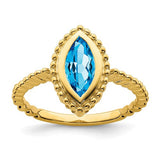 14k gold marquise blue topaz ring featuring a sparkling blue gemstone set in elegant jewelry ring design.