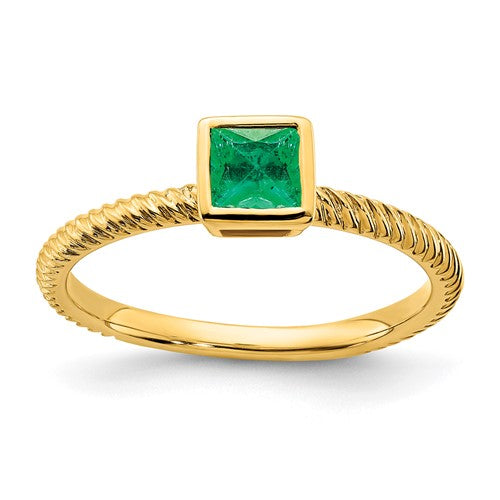 14k gold square bezel emerald ring featuring a vibrant green emerald gemstone set in a sleek Solomon Jewelers design.