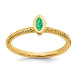 14k gold marquise bezel emerald ring featuring a vibrant green emerald gemstone and elegant design by Solomon Jewelers