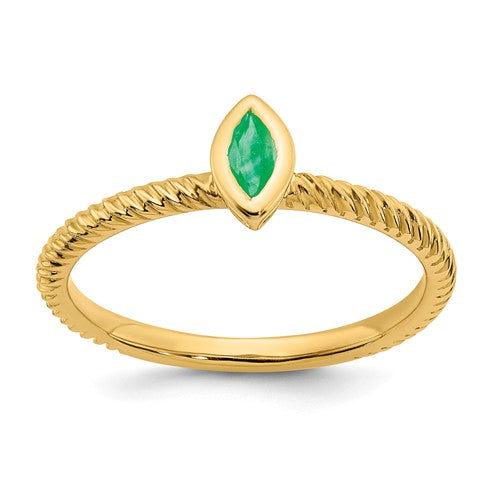 14k gold marquise bezel emerald ring featuring a vibrant green emerald gemstone and elegant design by Solomon Jewelers