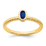 14k gold oval bezel sapphire ring featuring a vibrant blue sapphire gemstone set in a sleek Solomon Jewelers jewelry ring.
