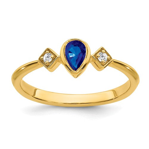 14k gold pearl bezel sapphire and diamond ring, elegant jewelry piece with sparkling accents, crafted by Solomon Jewelers