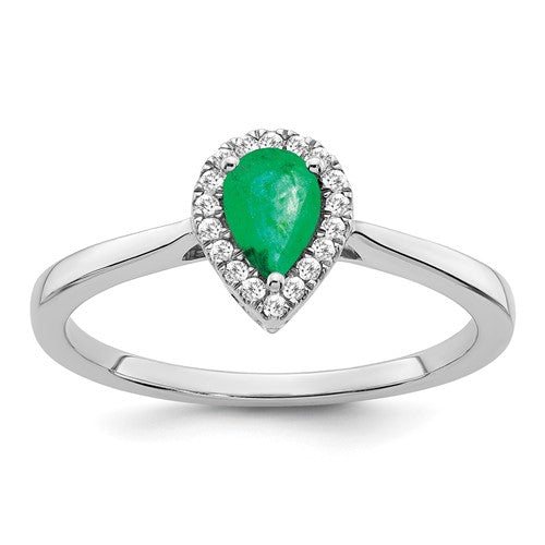 14k white gold pear emerald and diamond halo ring with intricate design, showcasing sparkling gemstones and elegant craftsmanship.
