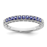 14k white gold Tanzanite and diamond ring featuring a central Tanzanite gemstone and diamond accents, elegant jewelry ring.