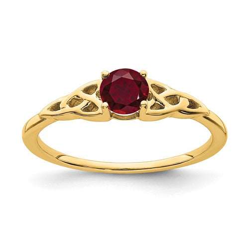 14K gold created ruby Celtic knot ring showing intricate design and vibrant red ruby gemstone.