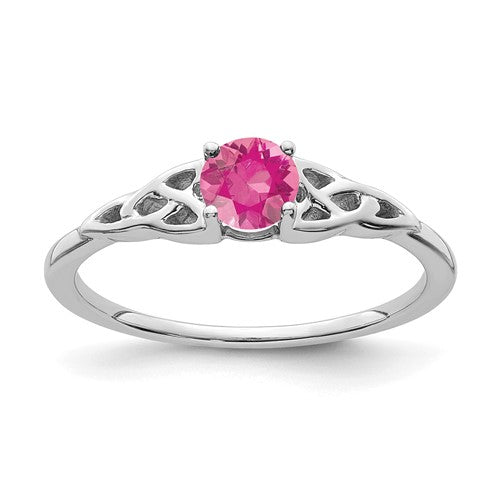 14K white gold Celtic knot ring with pink tourmaline gemstone, featuring intricate design and elegant craftsmanship.