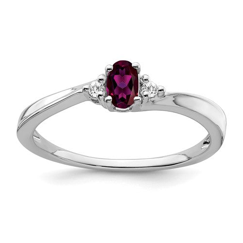 14k white gold ring with a vibrant rhodolite garnet centerpiece and diamond accents, elegant jewelry piece.