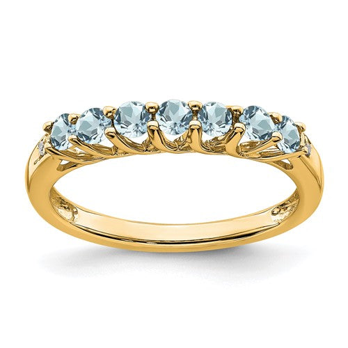 14k gold aquamarine and diamond 7-stone ring featuring sparkling gemstones and elegant design.