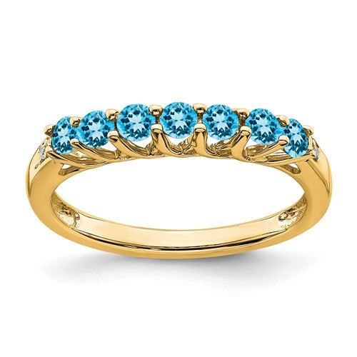 14k gold blue topaz and diamond 7-stone ring featuring sparkling gemstones and elegant design from Solomon Jewelers.