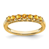 14k gold citrine and diamond 7-stone ring featuring a gold band and sparkling gemstones, designed by Solomon Jewelers.