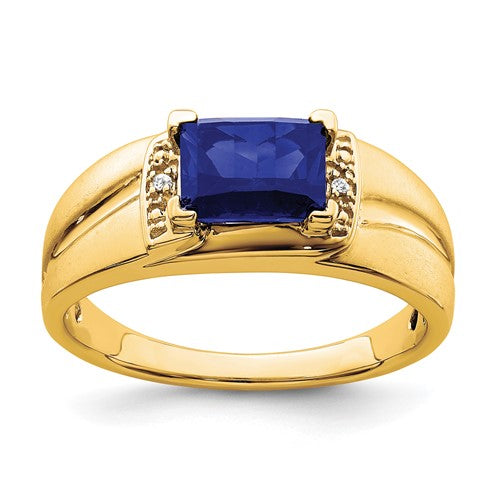 14k gold men's ring with emerald-cut created sapphire and diamond accents, elegant jewelry piece by Solomon Jewelers.