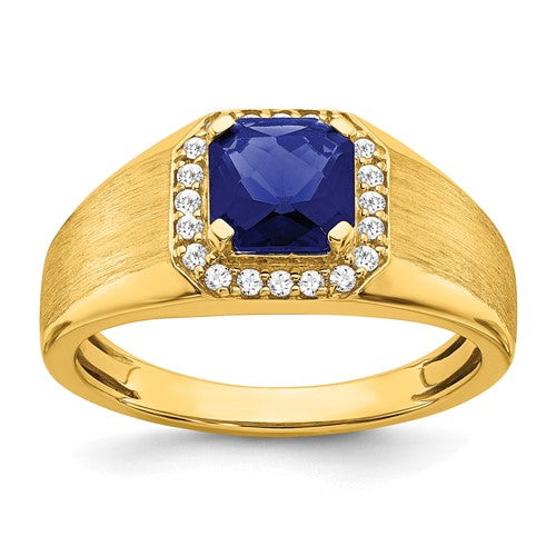 14k gold men's ring featuring a cushion-cut created sapphire and diamond accents, elegant jewelry by Solomon Jewelers.