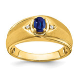 14k gold oval sapphire and diamond men's ring featuring intricate design and sparkling gemstones from Solomon Jewelers.