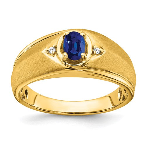 14k gold oval sapphire and diamond men's ring featuring intricate design and sparkling gemstones from Solomon Jewelers.