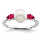 14k white gold pearl and ruby ring featuring a central pearl and ruby accents, elegant jewelry ring by Solomon Jewelers.
